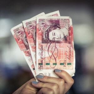 Photo of someone holding cash